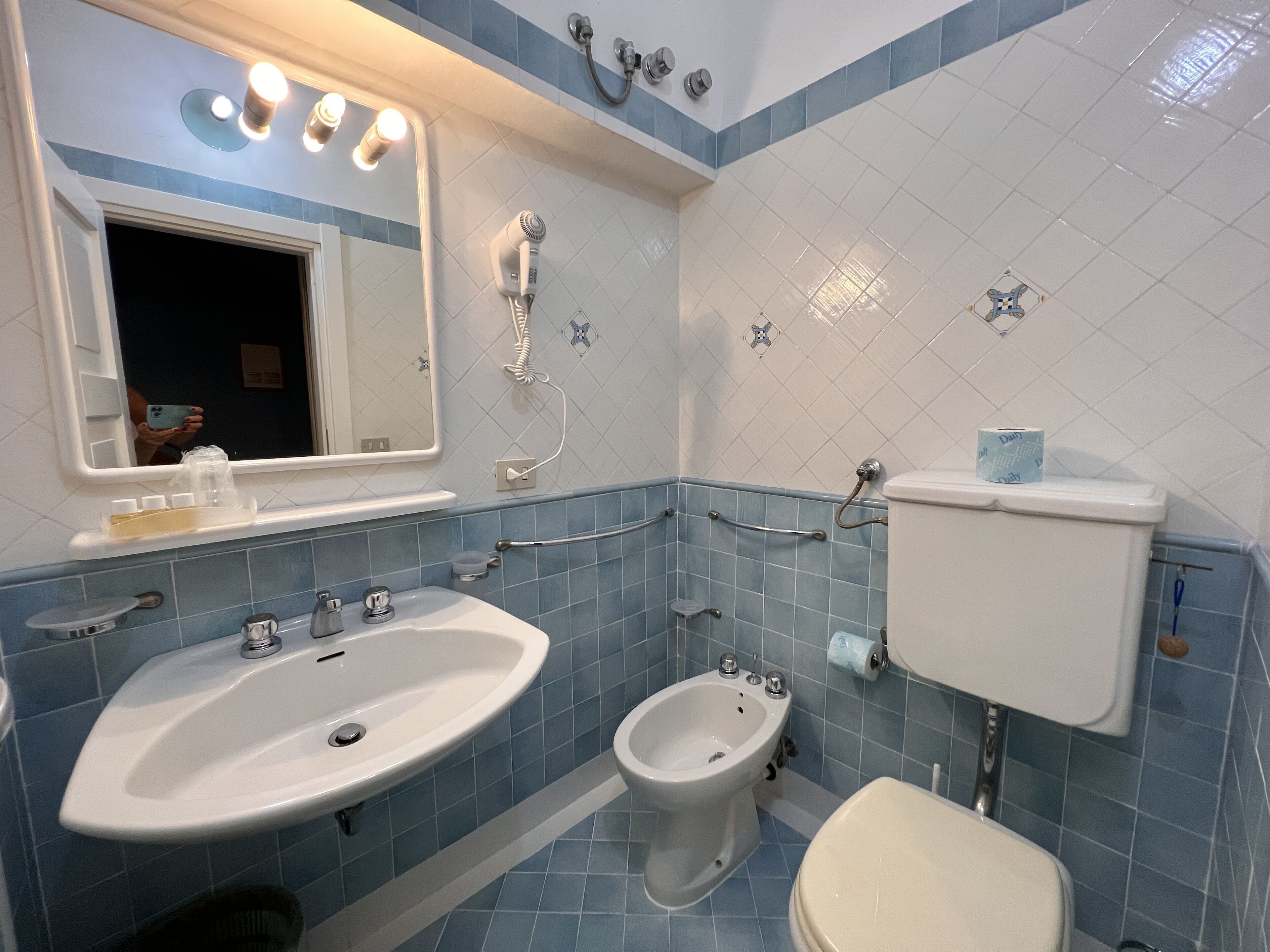 economy triple room, multiple beds | bathroom | shower, hair dryer, towels