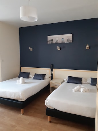 Quadruple Room. Hostellerie du Cheval Blanc