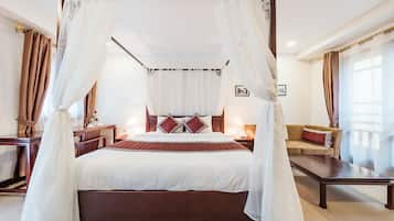 Premium Suite, 1 King Bed, Jetted Tub, City View | Premium bedding, pillowtop beds, minibar, in-room safe