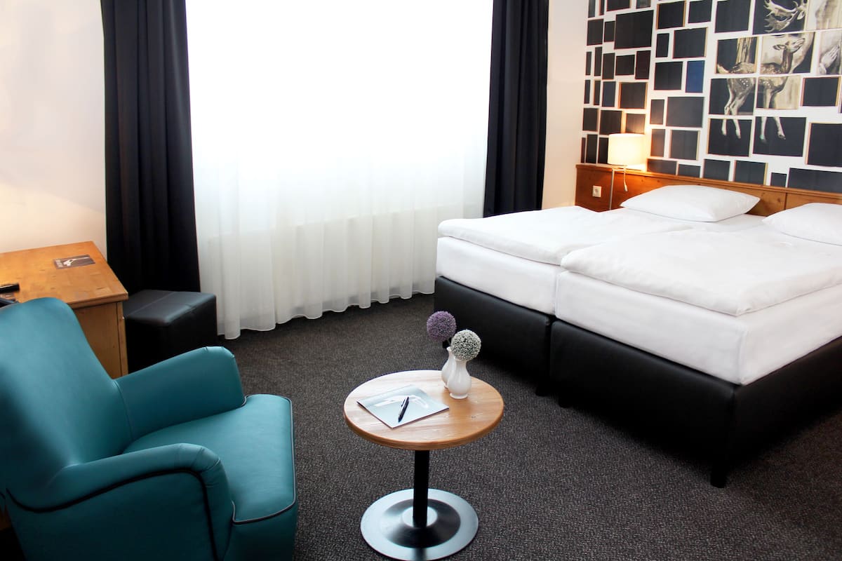 Premium bedding, memory foam beds, minibar, in-room safe