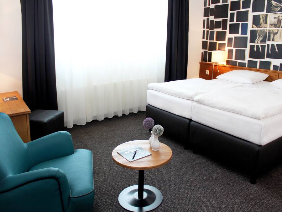 Premium bedding, memory-foam beds, minibar, in-room safe