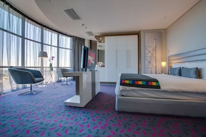 Premium bedding, down comforters, in-room safe, desk