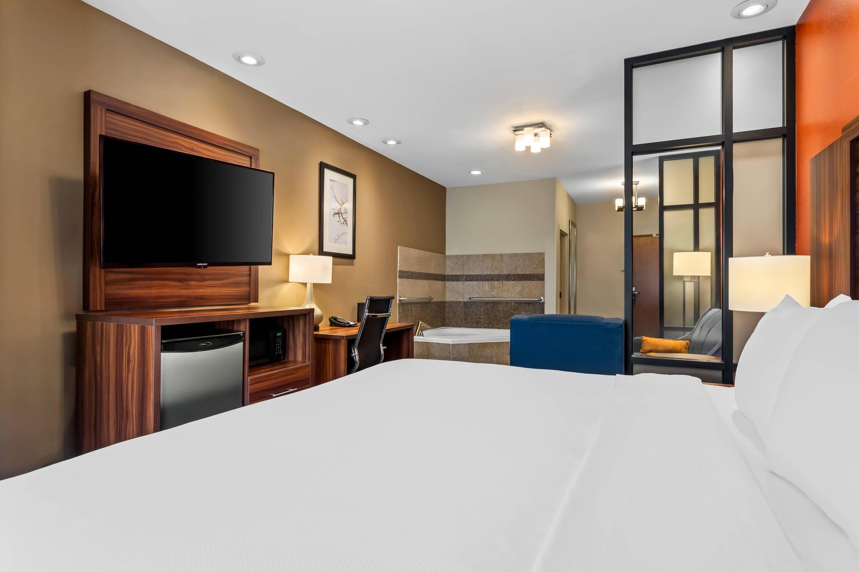 Camas con pillow-top, escritorio y espacio para trabajar con laptop 