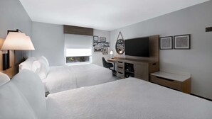 A hotel room with two beds, a desk, a chair, a TV, and artwork on the walls. - Hampton Inn Anderson/ Alliance Business Park (Anderson)