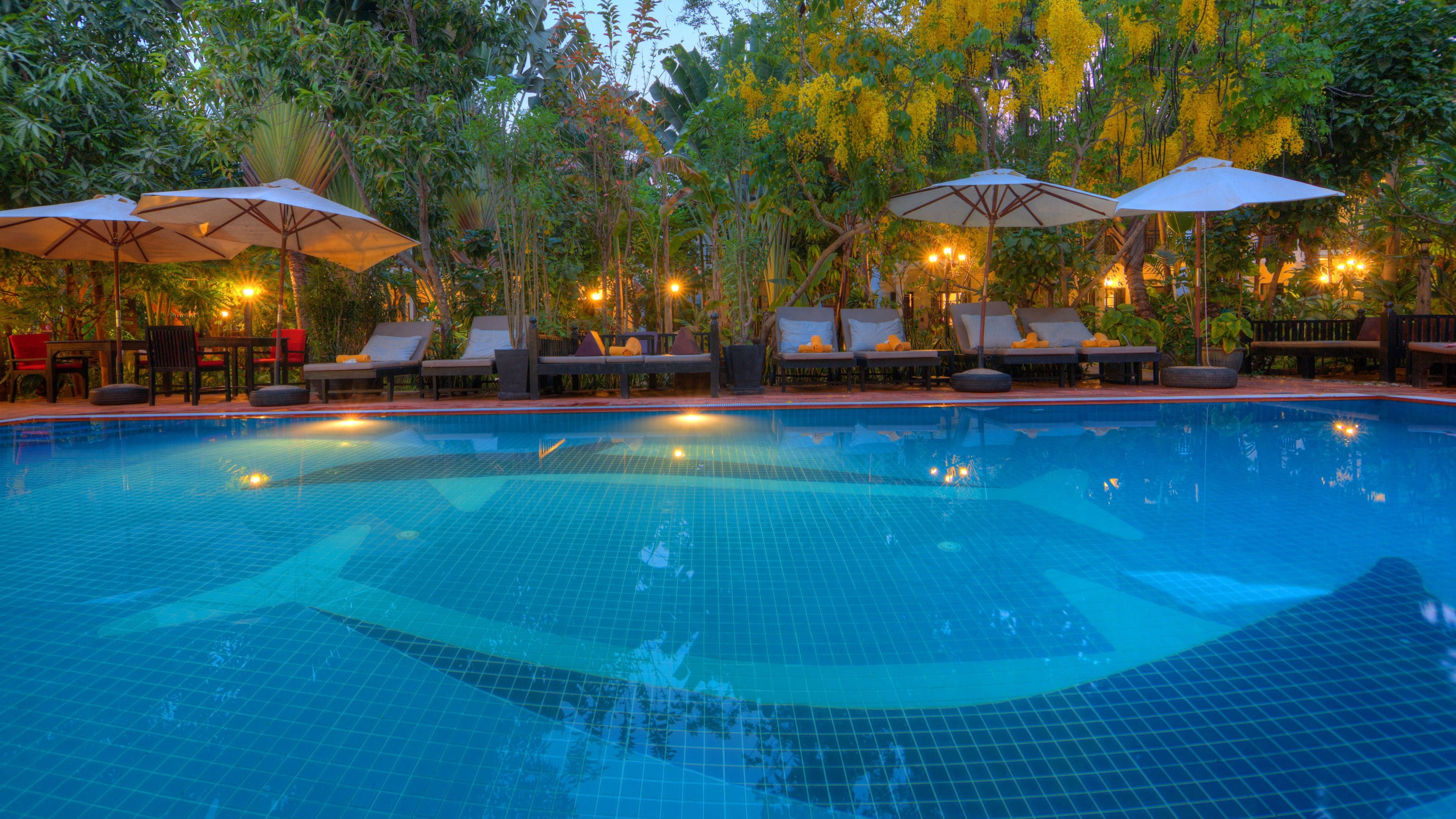 2 outdoor pools, pool umbrellas, pool loungers