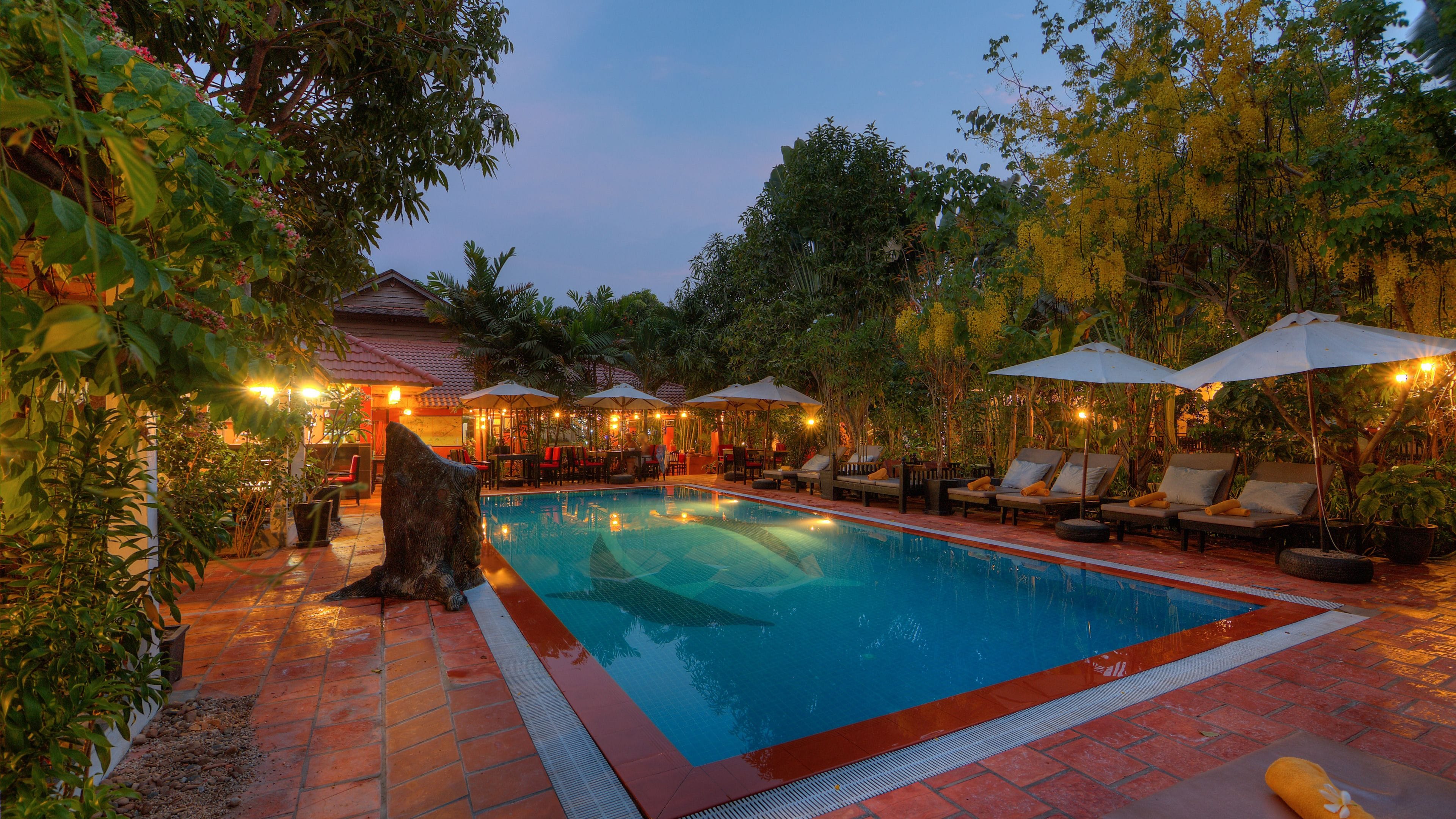 2 outdoor pools, pool umbrellas, pool loungers