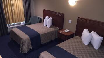 Kamar Deluks (Smoking and Non Smoking) | Bantalan ekstra lembut, tirai kedap cahaya, dan setrika/meja setrika