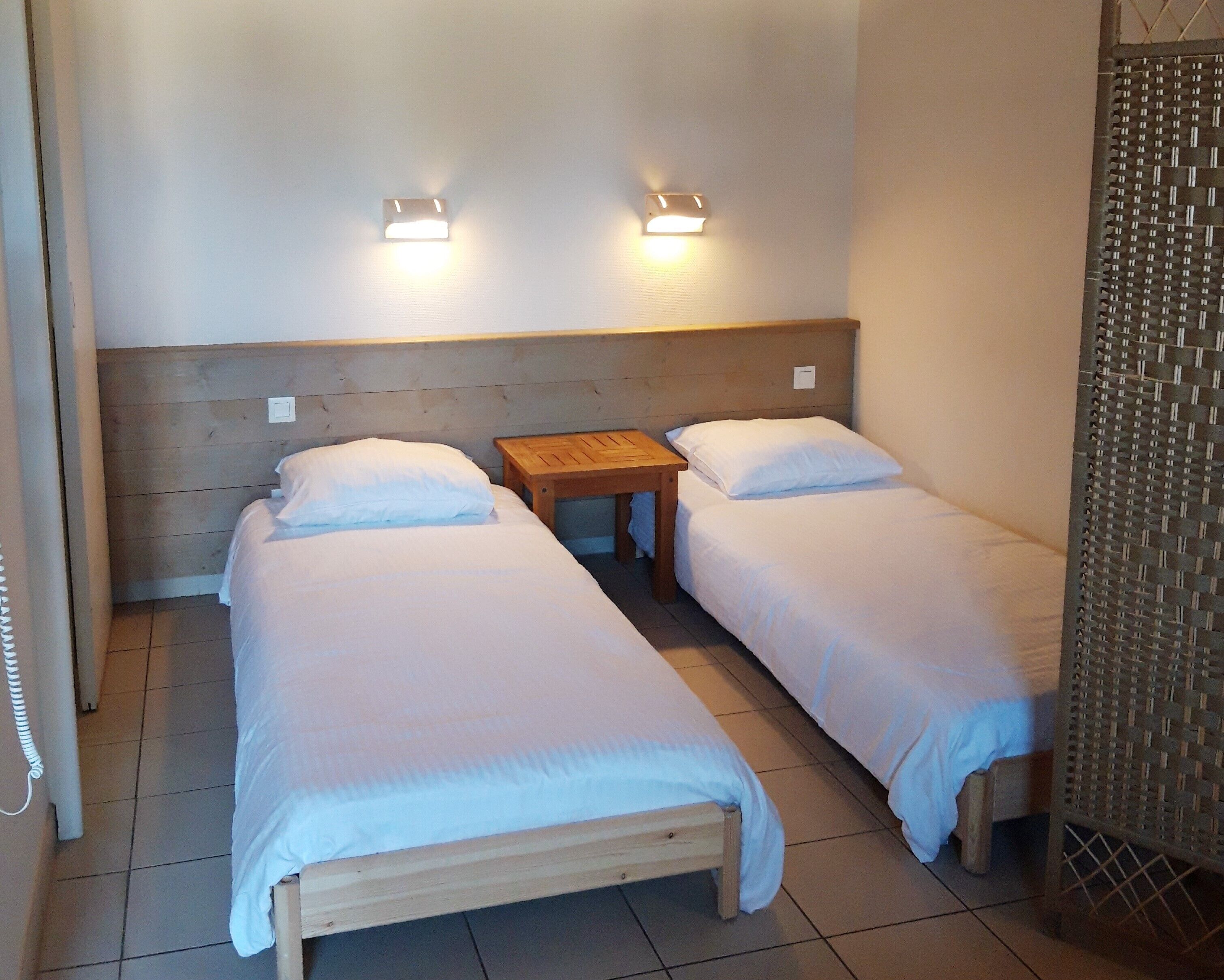 room, multiple beds, garden view, garden area | premium bedding, memory-foam beds, in-room safe, individually decorated