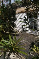 Quarto, várias camas, vista para o jardim, no jardim | Terraço/pátio