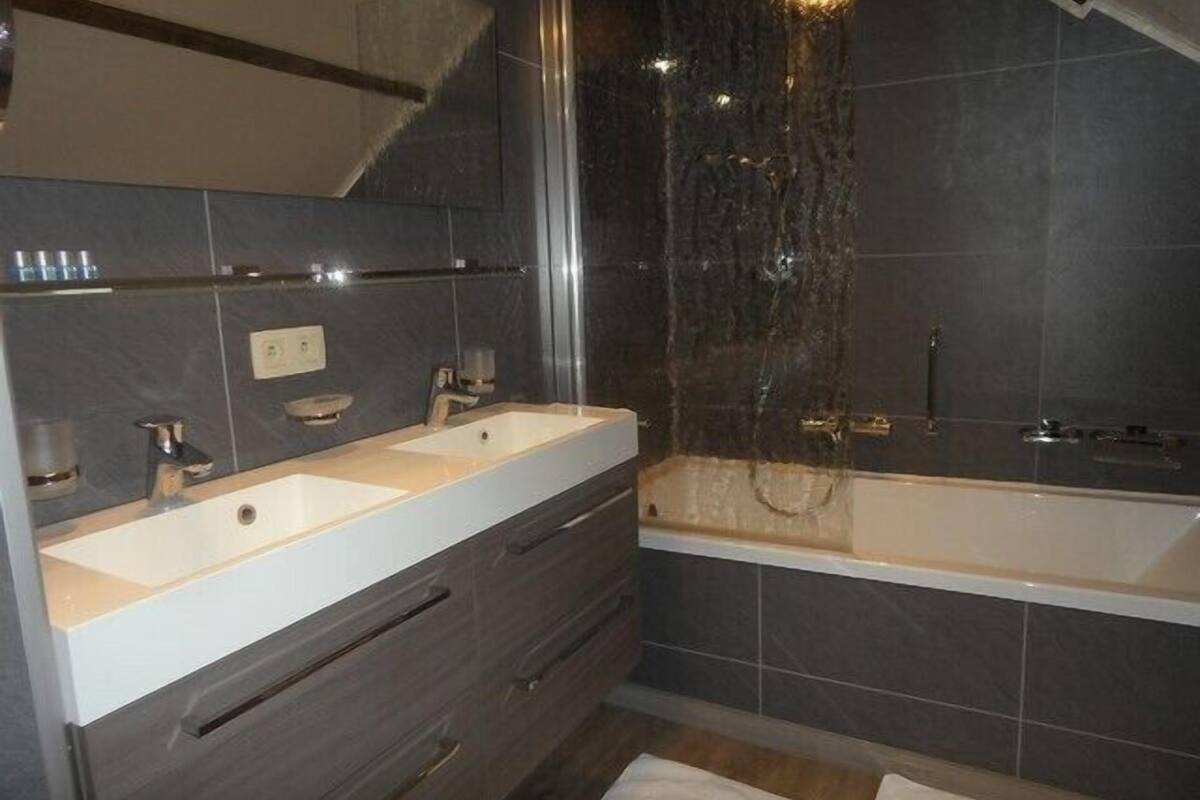 comfort quadruple room | bathroom | free toiletries, hair dryer, towels