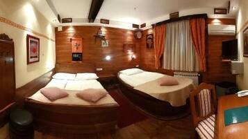 Triple Room | Hypo-allergenic bedding, minibar, in-room safe, desk