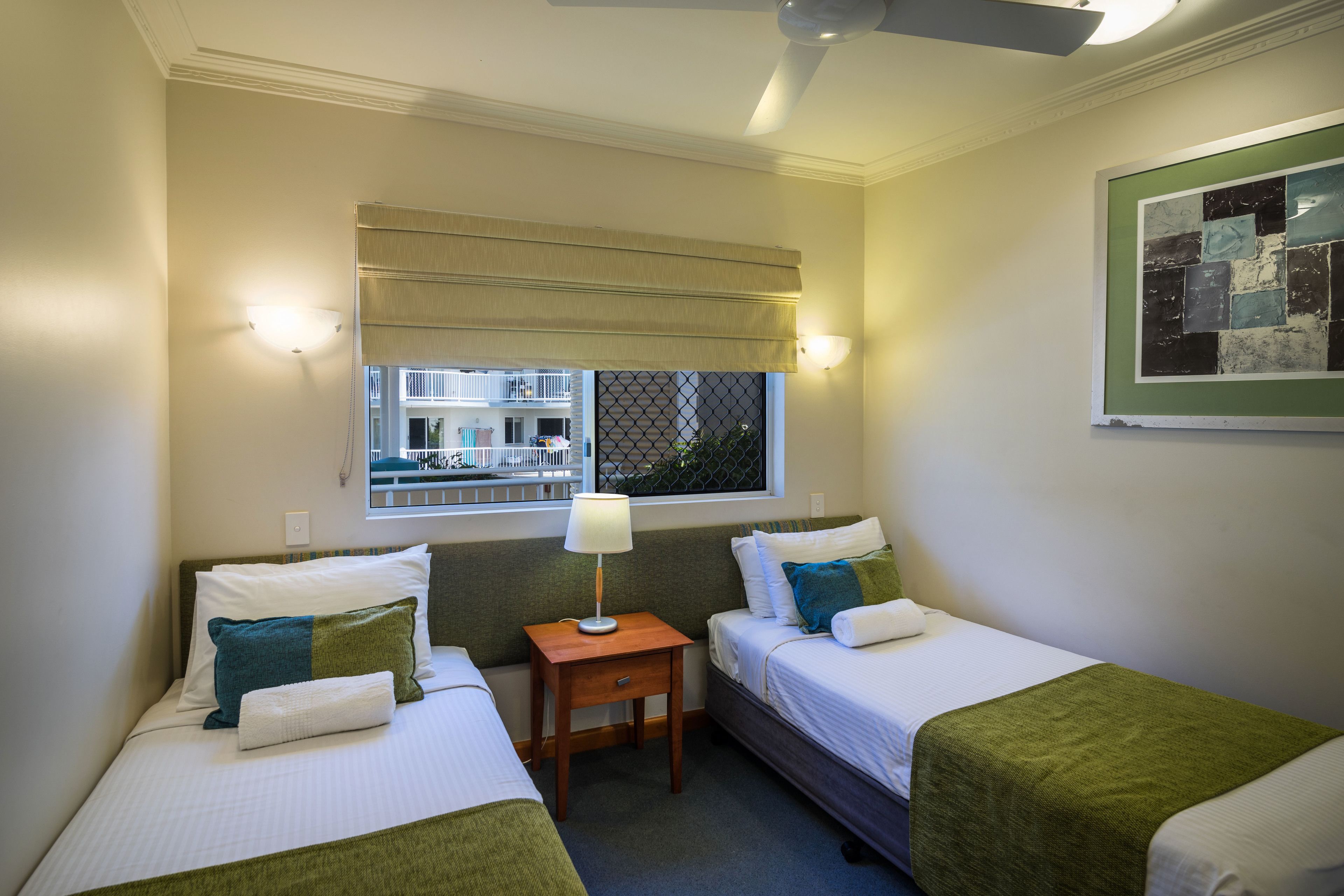 premium bedding, pillow-top beds, blackout curtains, iron/ironing board