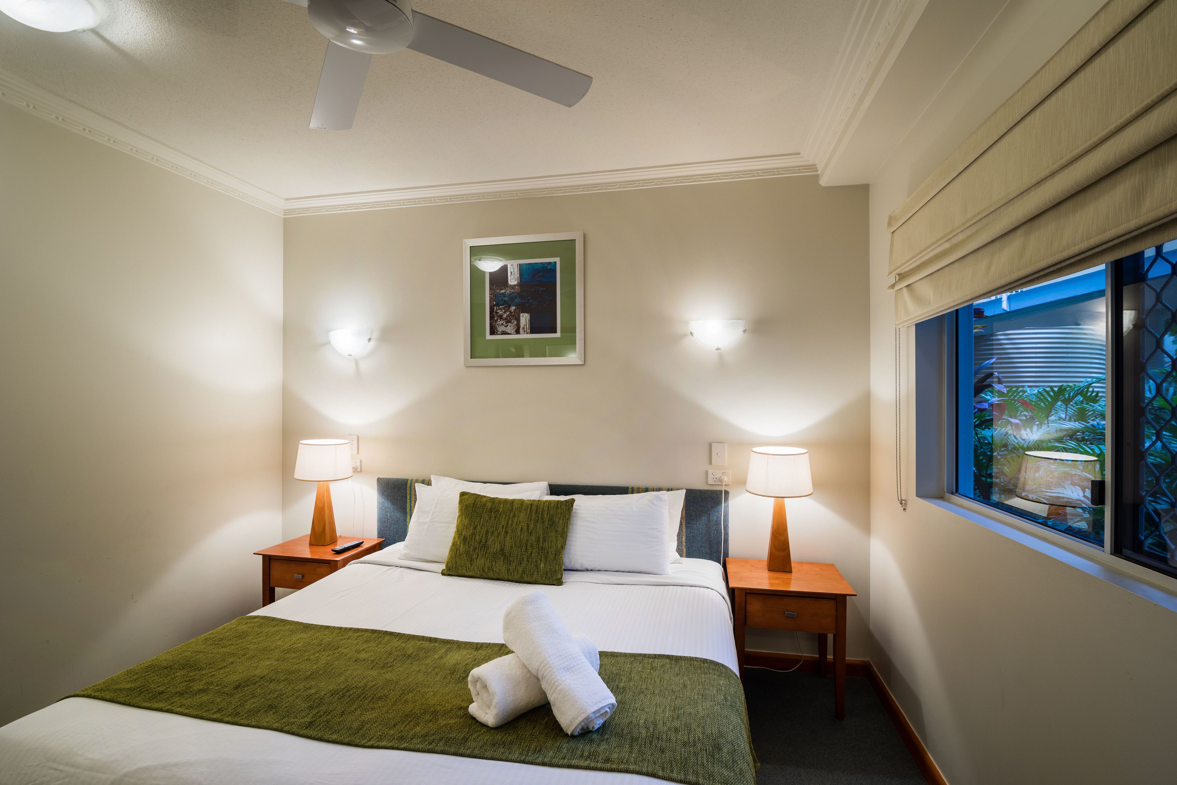 premium bedding, pillow-top beds, blackout curtains, iron/ironing board