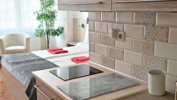 Apartment 2 Persons | Private kitchen | Fridge, stovetop, coffee/tea maker, electric kettle