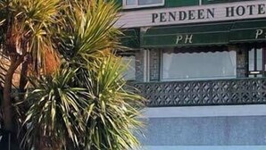 A building with a sign reading "PENDEEN HOTEL" and a partially visible "PH" logo. - Pendeen Hotel (Newquay)