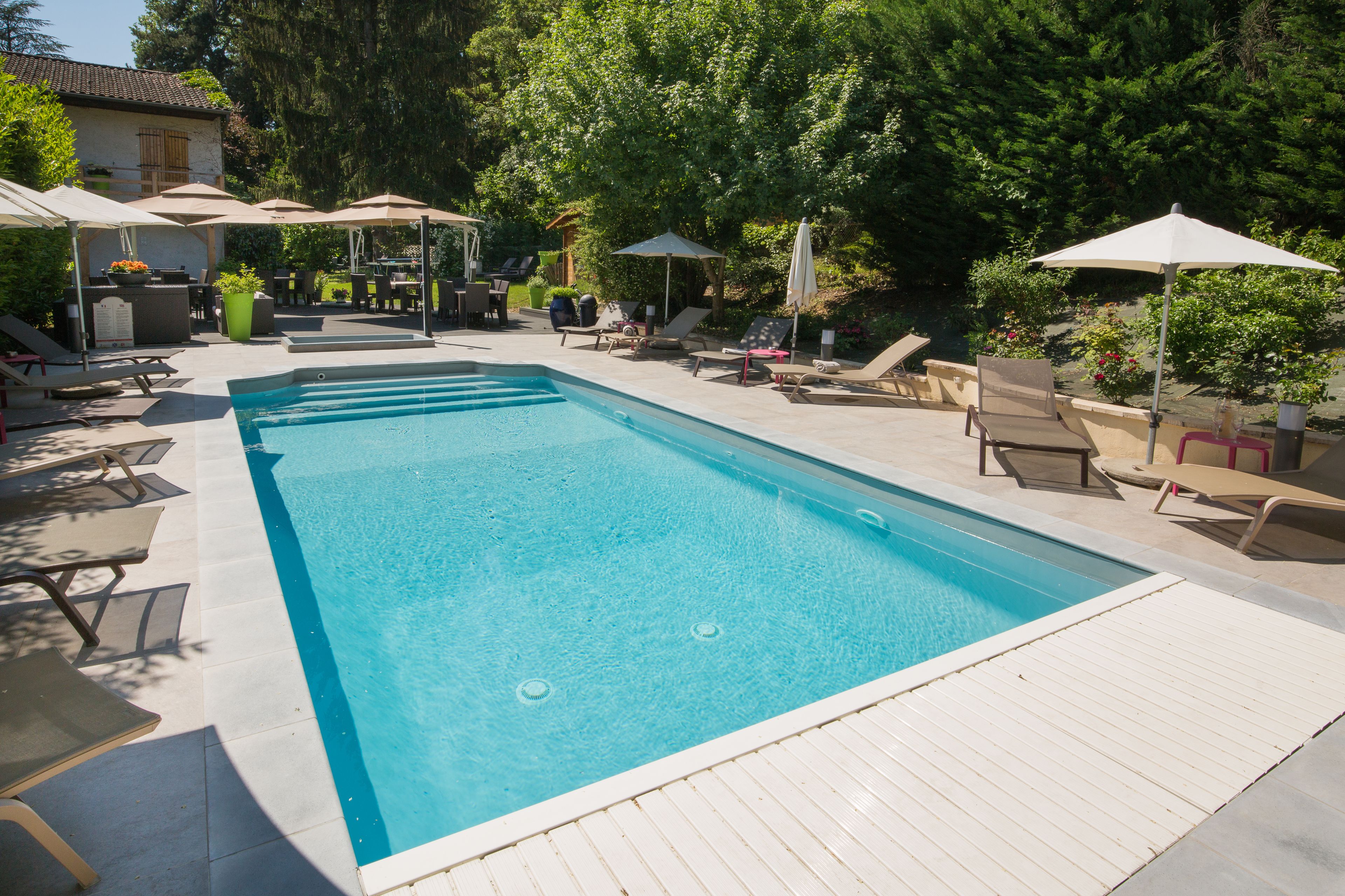 seasonal outdoor pool, open 9 am to 8:30 pm, pool loungers