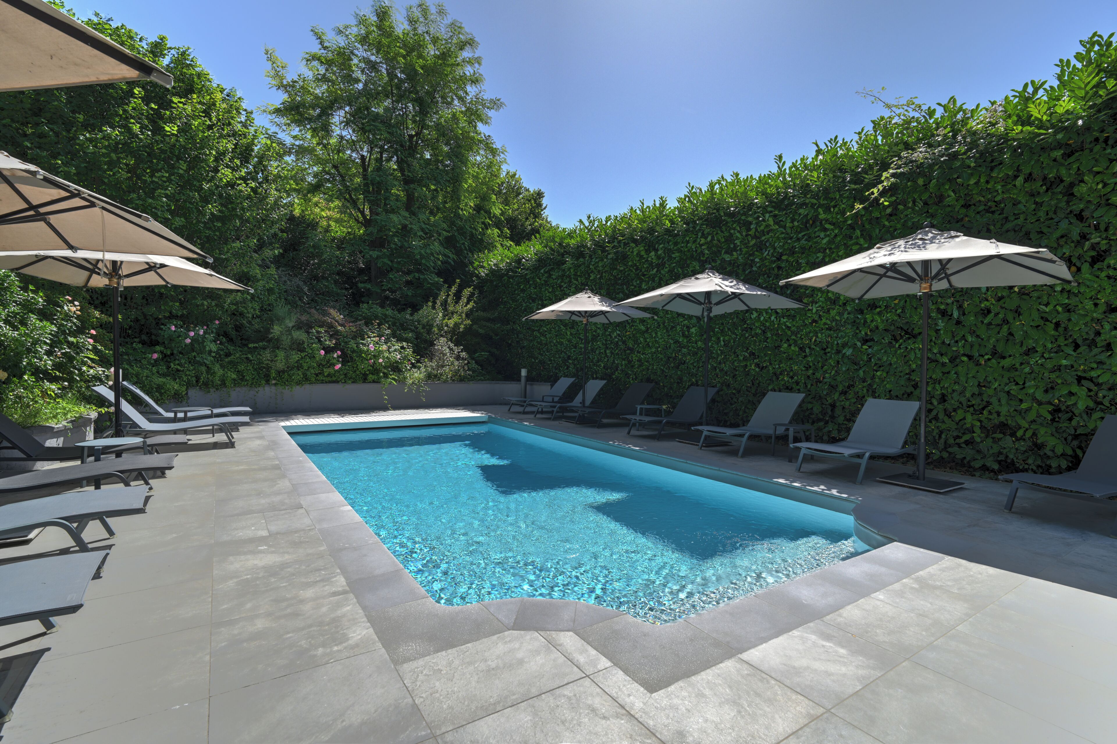 Seasonal outdoor pool, open 9 AM to 8:30 PM, sun loungers