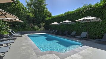 Seasonal outdoor pool, open 9 AM to 8:30 PM, sun loungers