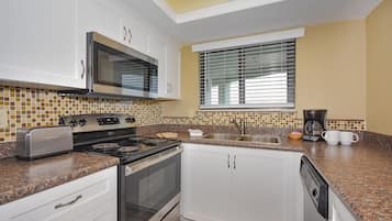 Fridge, stovetop, coffee/tea maker