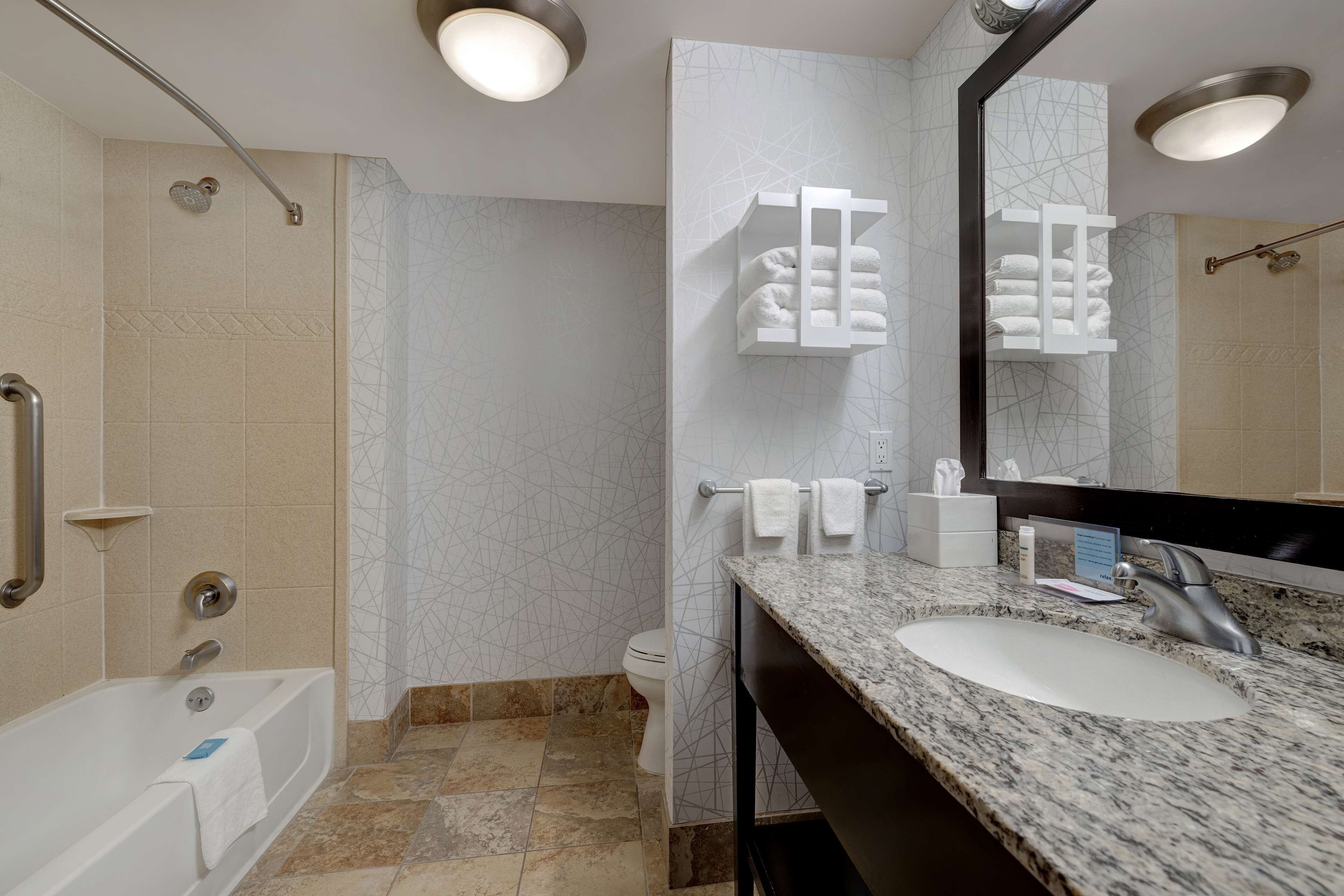 room, 2 queen beds | bathroom | combined shower/bathtub, free toiletries, hair dryer, bathrobes