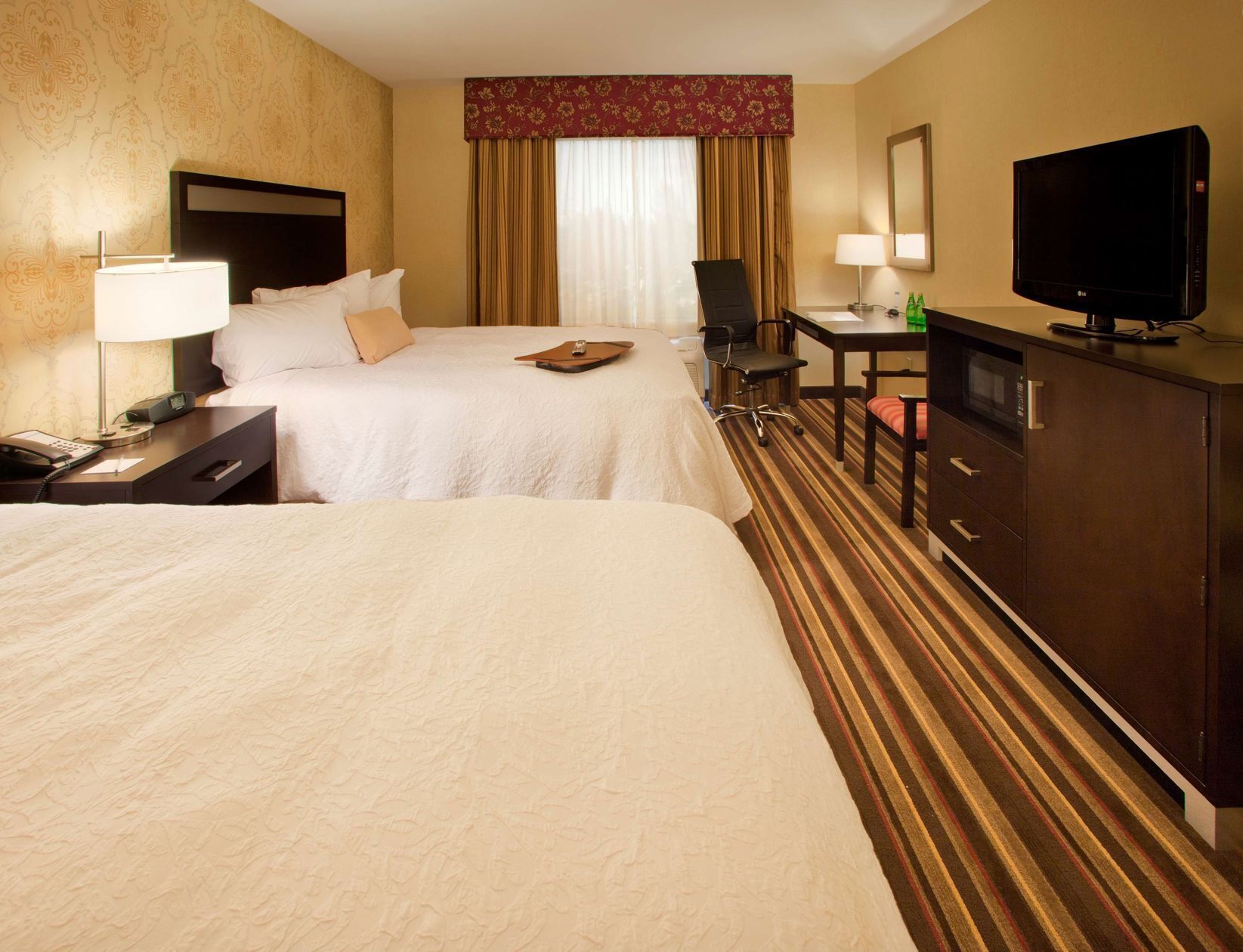 Premium bedding, pillow-top beds, in-room safe, laptop workspace