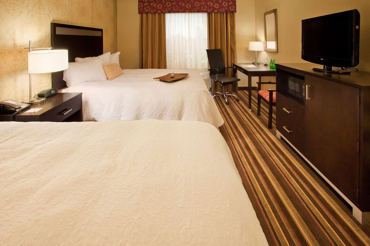 Premium bedding, pillow-top beds, in-room safe, laptop workspace