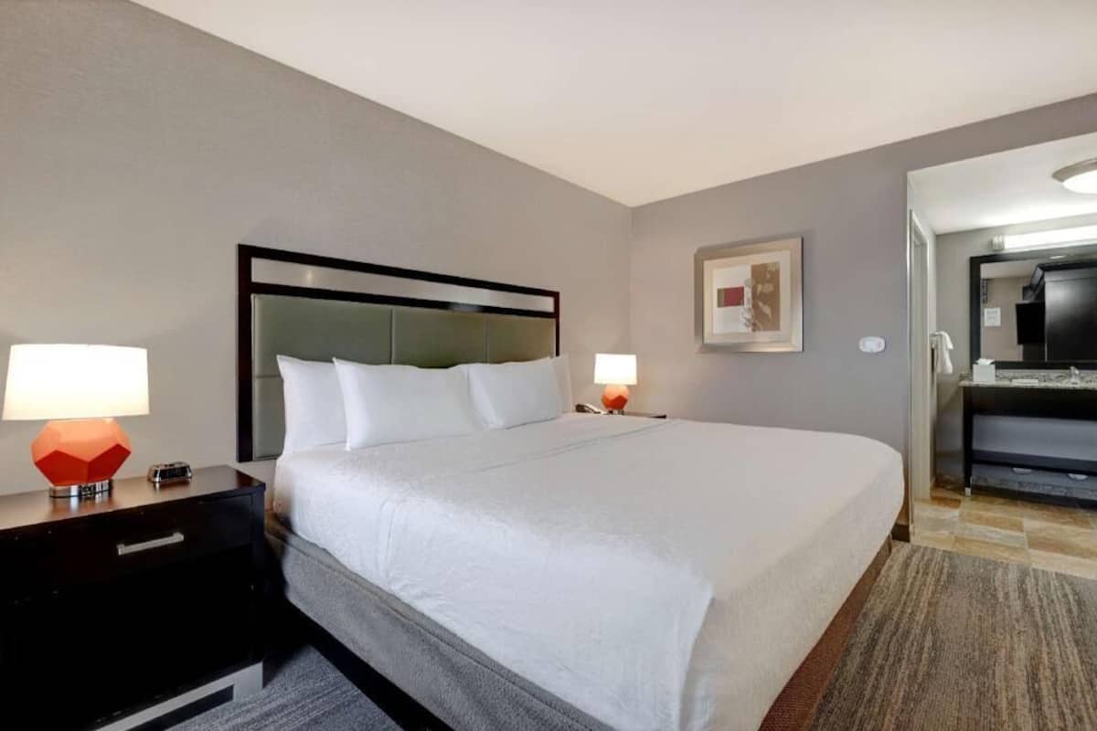 Premium bedding, pillow-top beds, in-room safe, laptop workspace