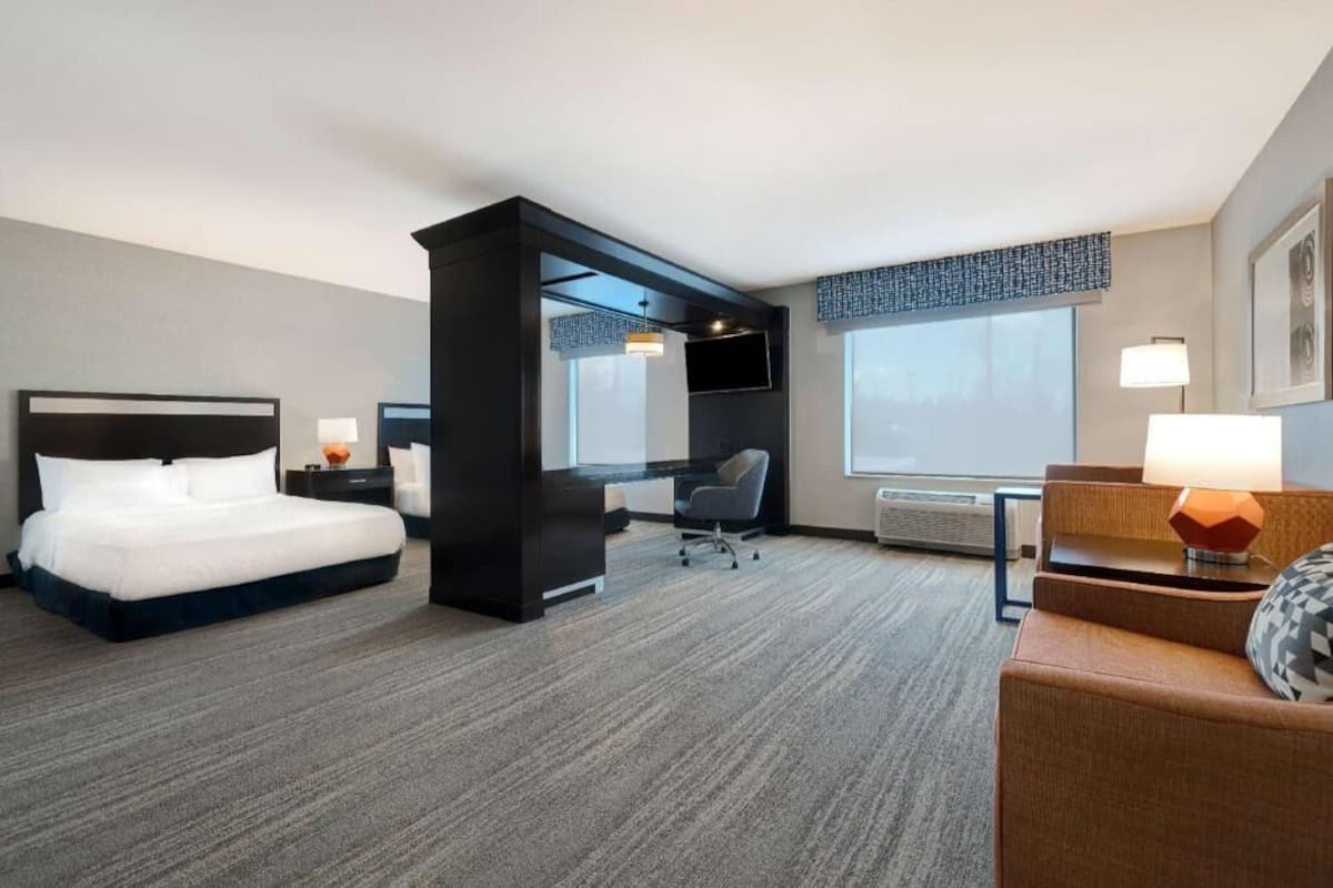 Premium bedding, pillow-top beds, in-room safe, laptop workspace