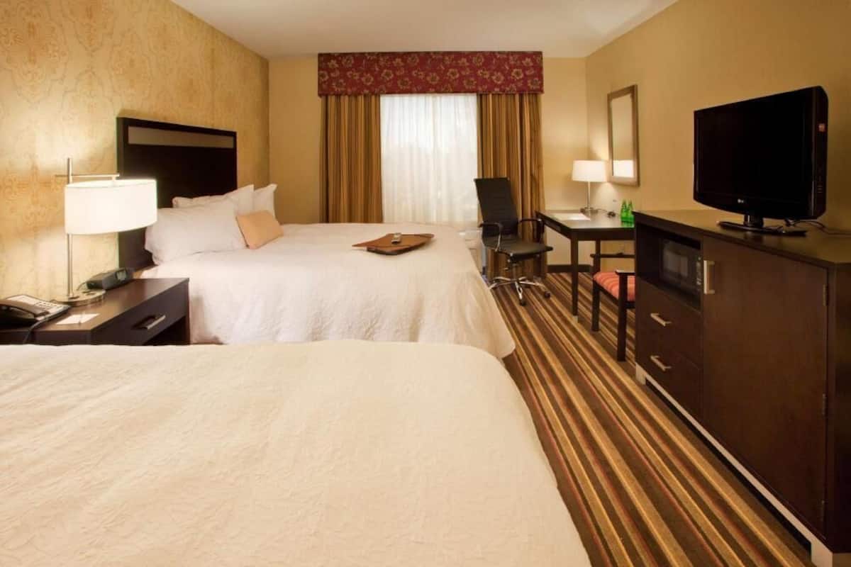 Premium bedding, pillow-top beds, in-room safe, laptop workspace