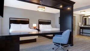 A hotel room with two beds, a desk, a chair, and a large mirror. - Hampton Inn & Suites Seattle/Federal Way (Federal Way)