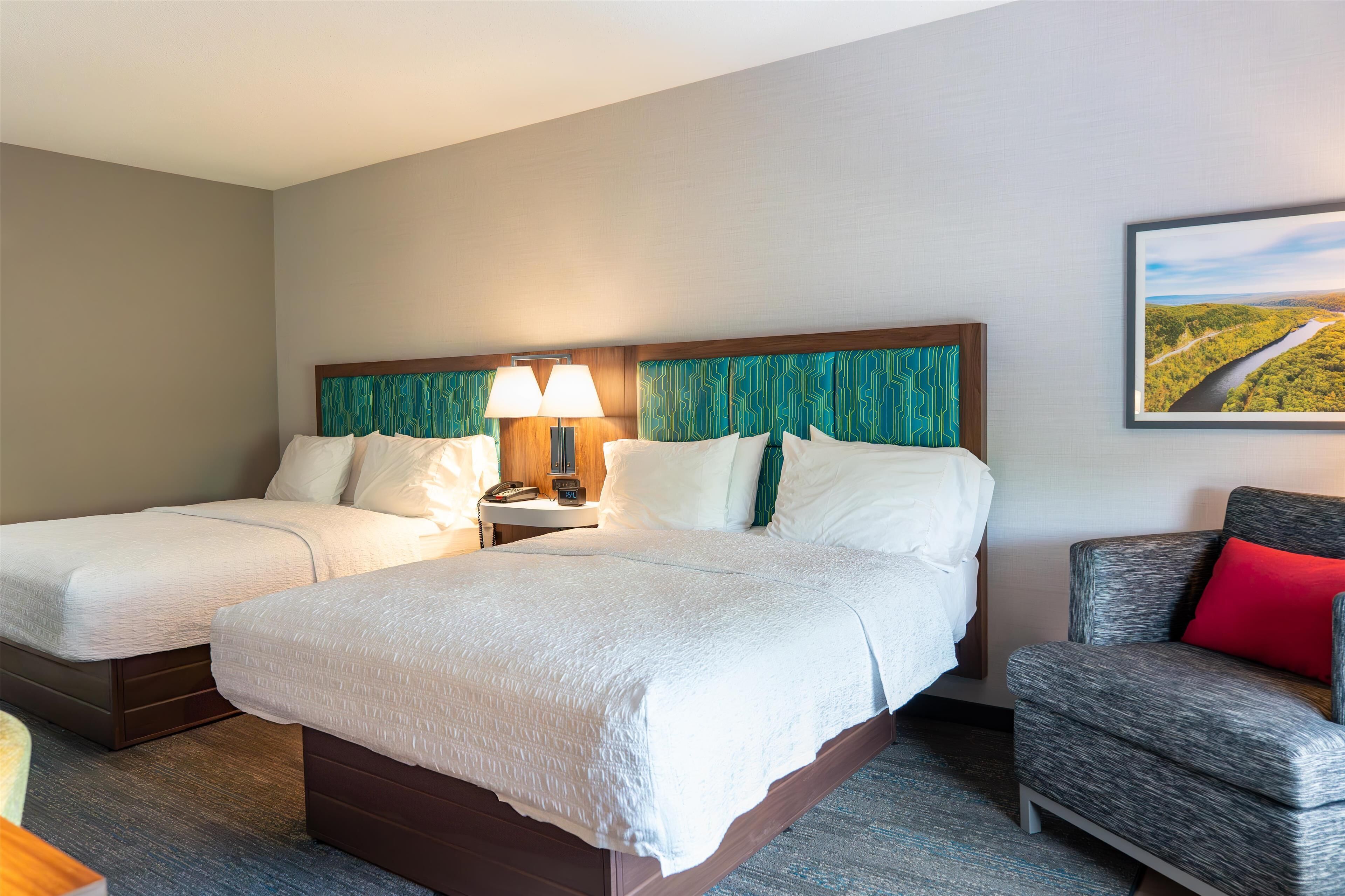 room, 2 queen beds | in-room safe, iron/ironing board, free wifi, bed sheets