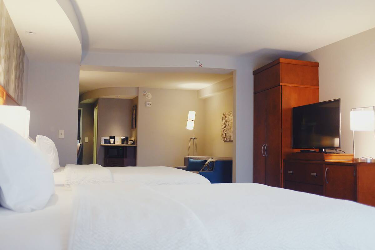 desk, blackout curtains, iron/ironing board, free cots/infant beds