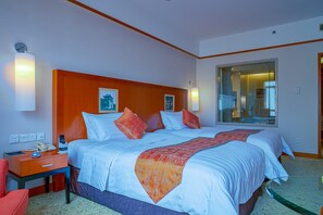 Habitación Deluxe, 2 camas individuales | Ropa de cama de alta calidad, caja fuerte, escritorio