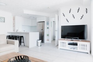 Apartment, 1 Bedroom | Living area | Plasma TV, table tennis - Royal Pacific Resort (Biggera Waters)