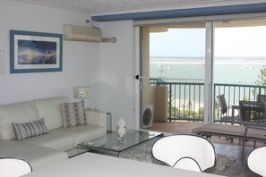 Apartment, 1 Bedroom | Living area | Plasma TV, table tennis - Royal Pacific Resort (Biggera Waters)