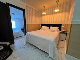 Family Double Room | Minibar, in-room safe, desk, free WiFi