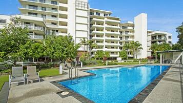 Outdoor pool, open 7:00 AM to 9:00 PM, pool umbrellas, sun loungers