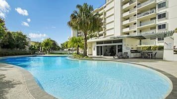 Outdoor pool, open 7:00 AM to 9:00 PM, pool umbrellas, sun loungers