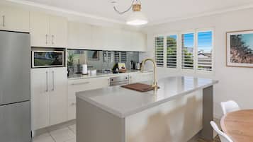 Deluxe Apartment, 2 Bedrooms | Private kitchen | Full-sized fridge, microwave, oven, stovetop