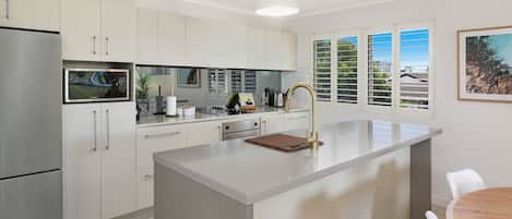 Deluxe Apartment, 2 Bedrooms | Private kitchen | Full-sized fridge, microwave, oven, stovetop