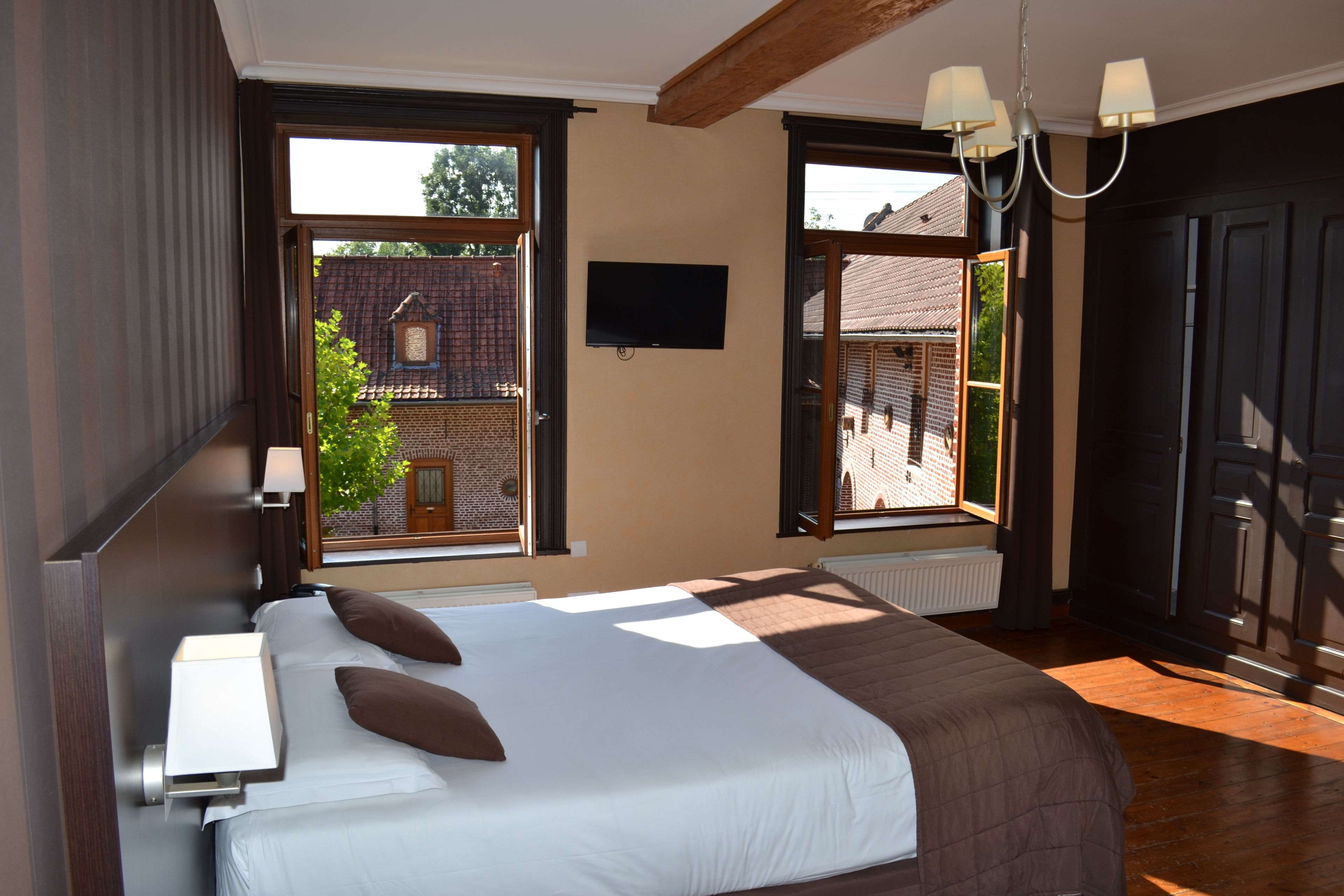 Standaard kamer | Een minibar, een kluis op de kamer, gratis wifi, beddengoed