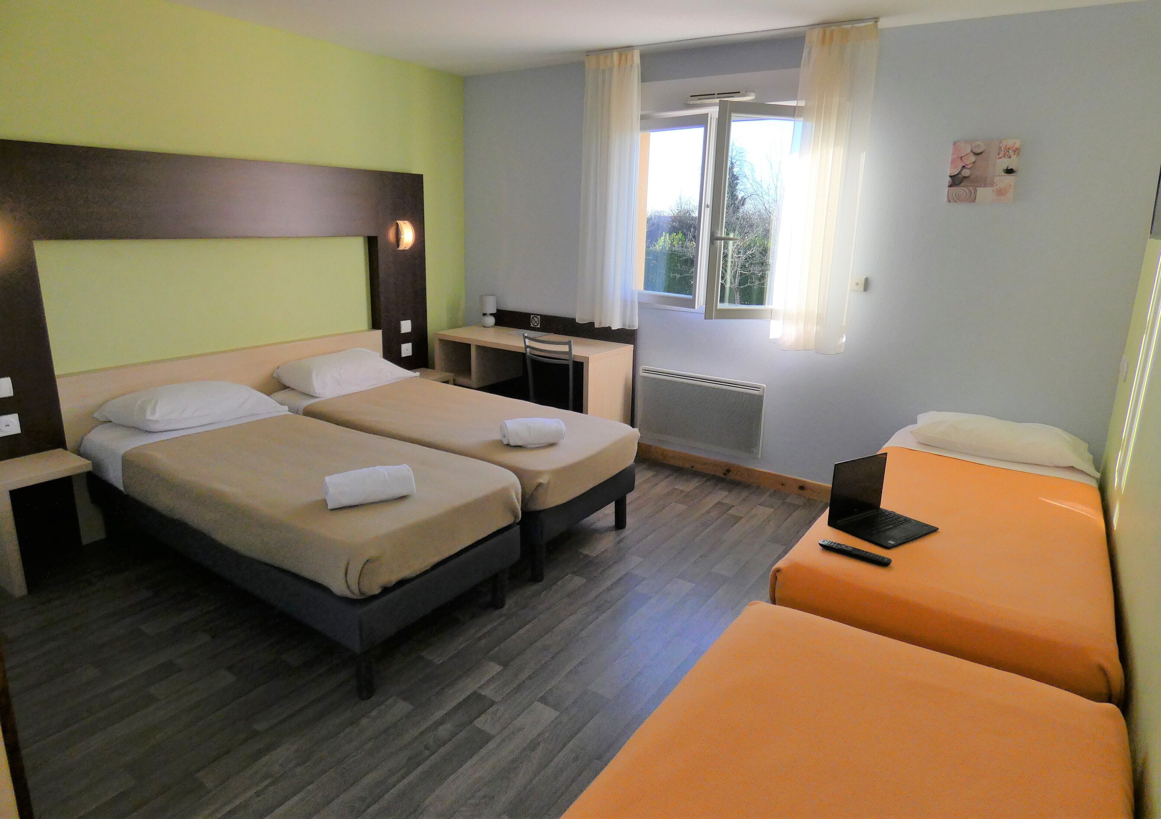 classic quadruple room | premium bedding, individually furnished, desk, laptop workspace