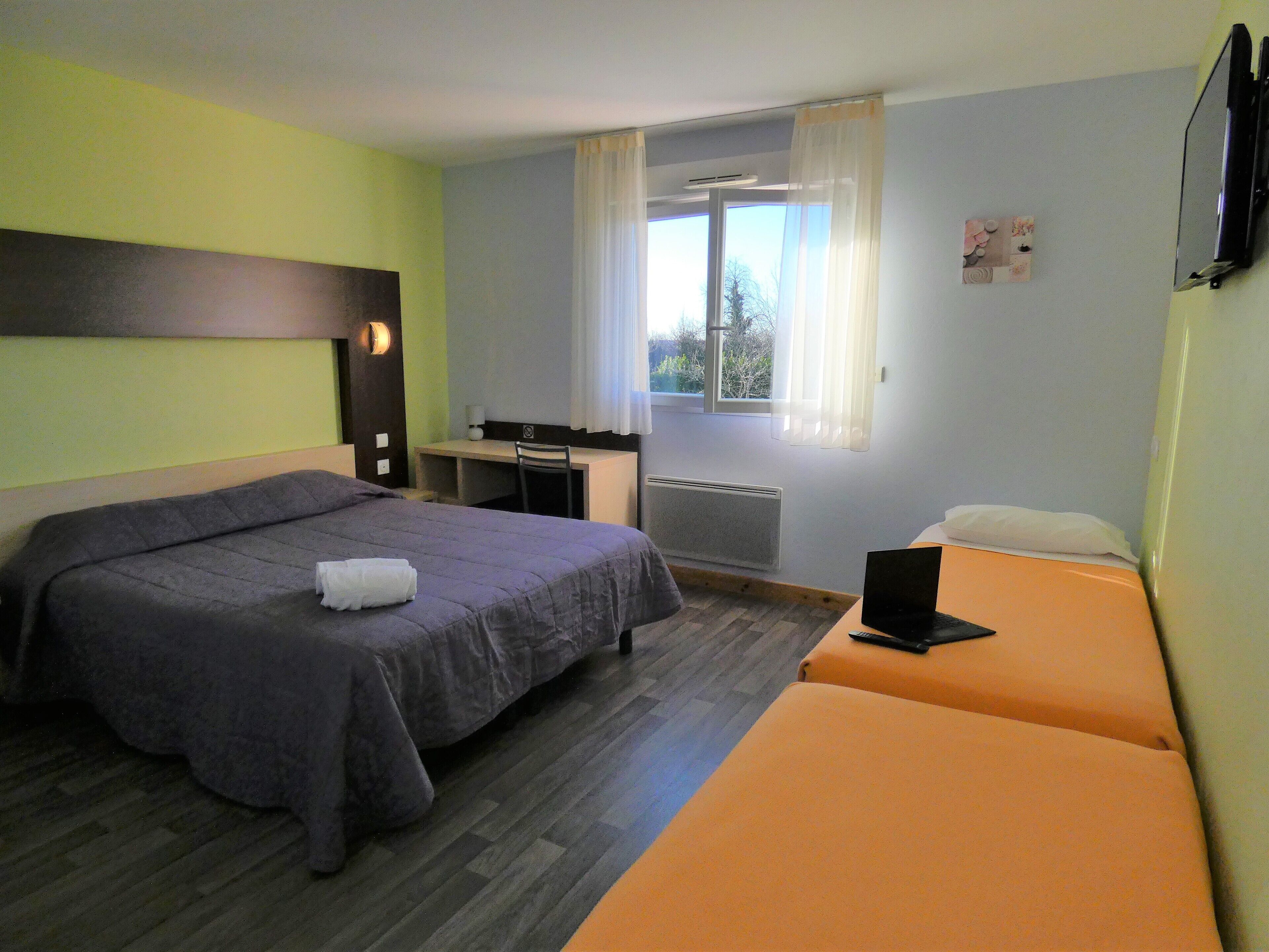 classic quadruple room | premium bedding, individually furnished, desk, laptop workspace