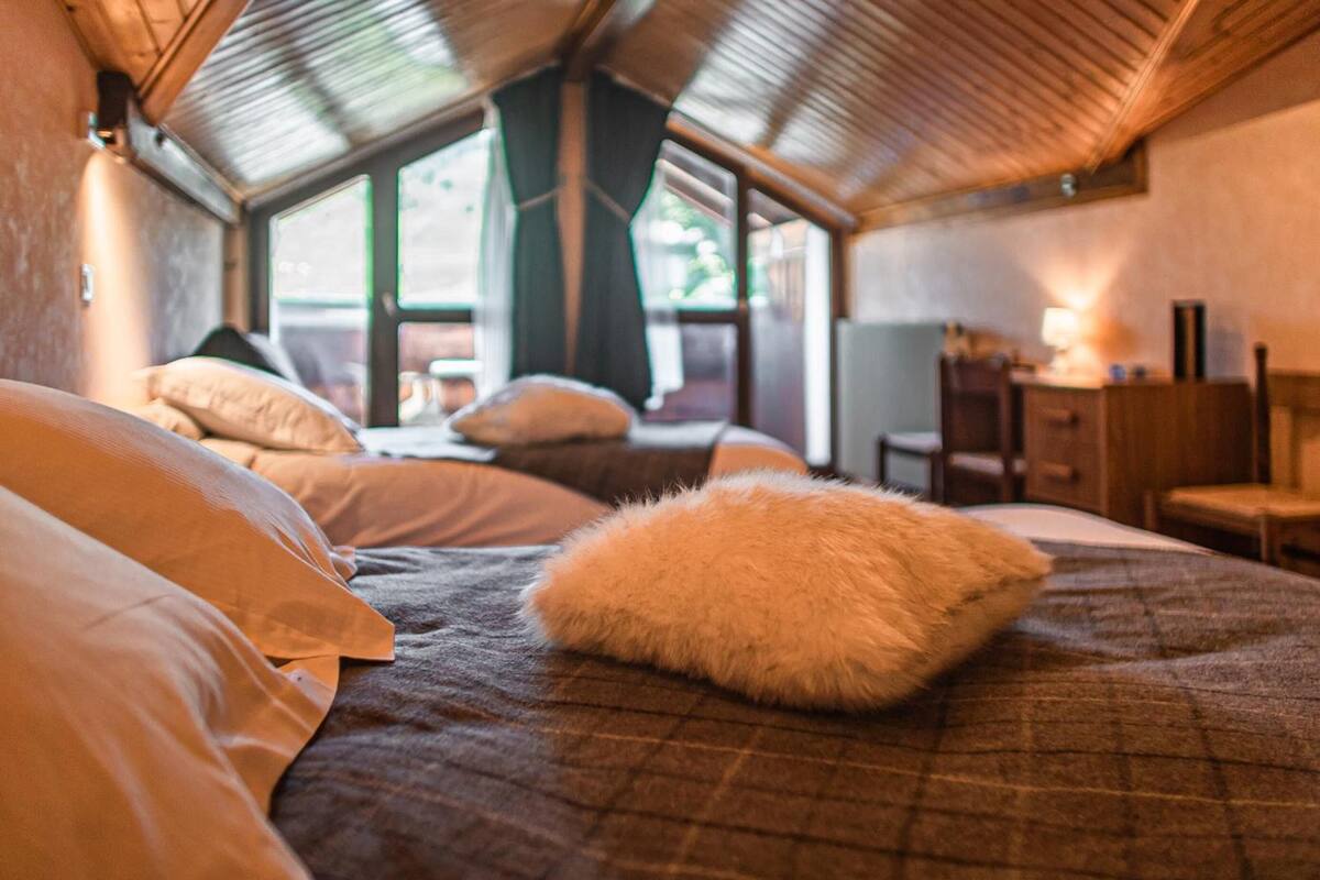 desk, blackout curtains, iron/ironing board, free cots/infant beds