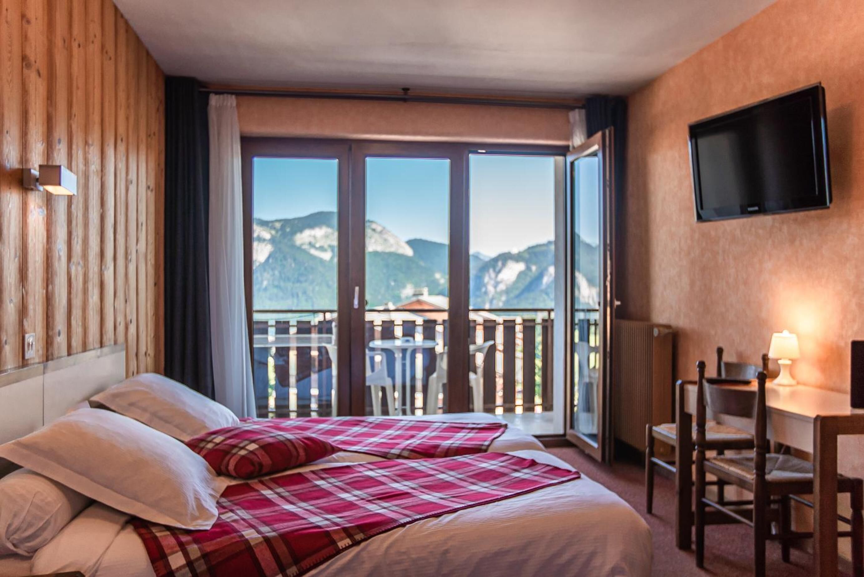 desk, blackout curtains, iron/ironing board, free cots/infant beds