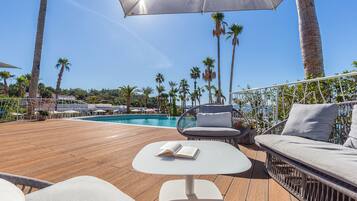 2 outdoor pools, pool umbrellas, pool loungers