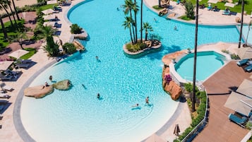2 outdoor pools, pool umbrellas, pool loungers