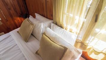 Premium bedding, down duvets, pillow-top beds, in-room safe
