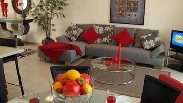 32-inch flat-screen TV with satellite channels, TV, DVD player