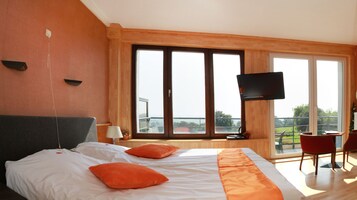 Habitación doble | Minibar, caja fuerte, wifi gratis y ropa de cama